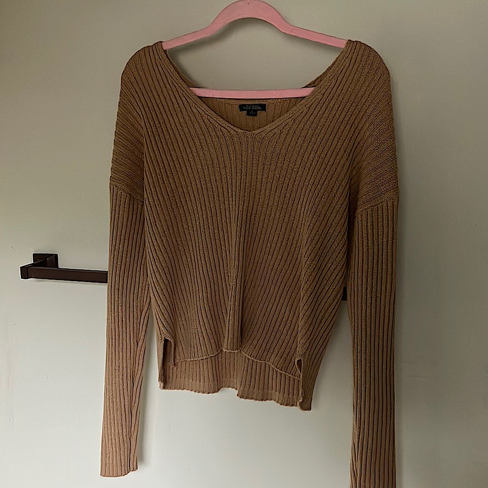 this is an adorable wild fable sweater!! it is lighter than the picture.